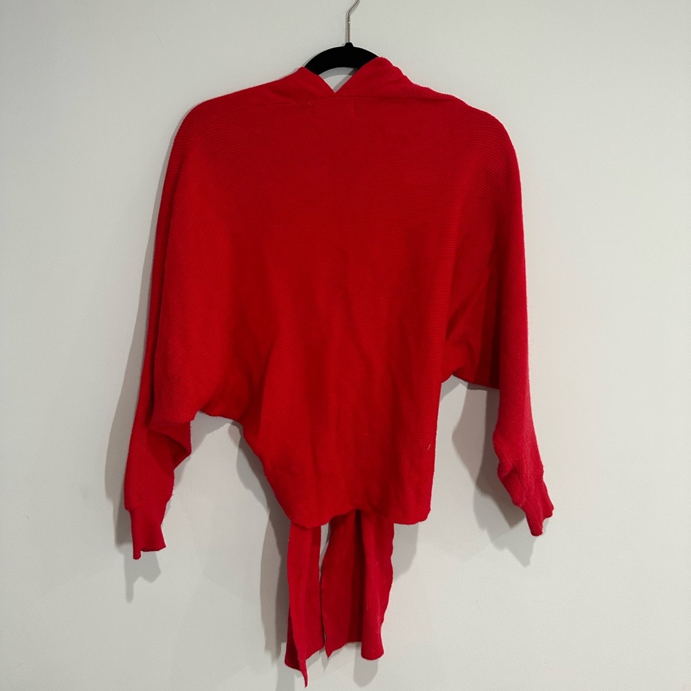 Seek the label wrap sweater. Size Medium
